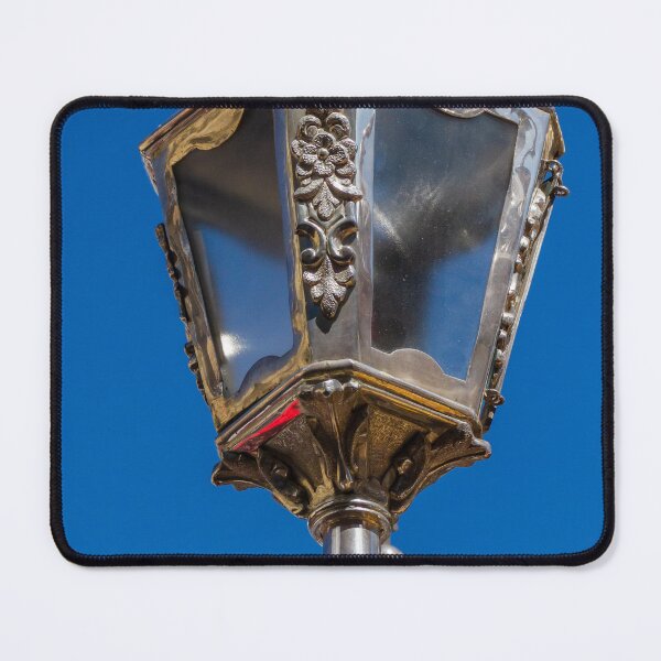 Item preview,  Decorative Silver Lantern Closeup With Ornate Floral Relief On Religious Statue In Church Interior designed and sold by Nmallia.