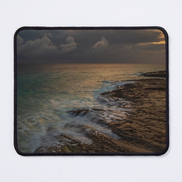 Item preview, Rocky Coastline at Sunset With Gentle Waves and Turquoise Sea Over Layered Limestone designed and sold by Nmallia.