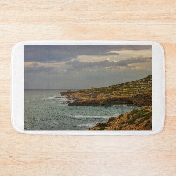 Item preview,  Rocky Coastal Cliffs Overlooking Turquoise Sea Under Moody Cloudy Sky With Old Stone Structures designed and sold by Nmallia.