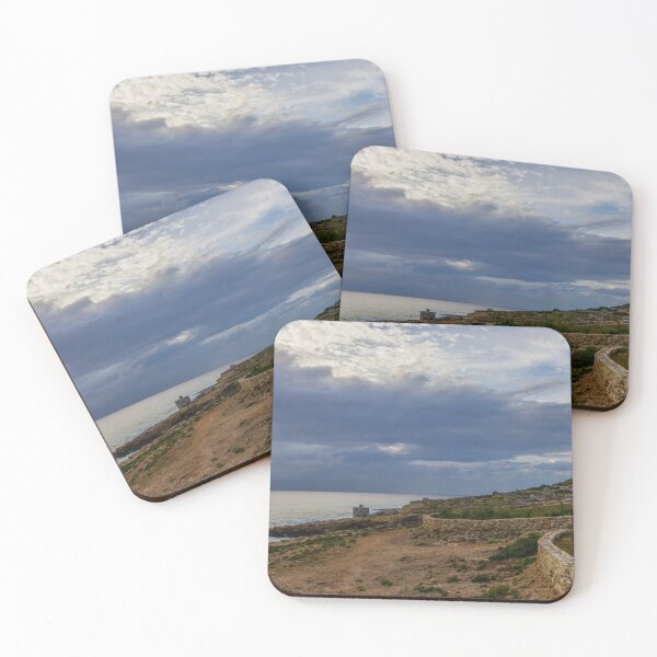 Item preview, Rocky Coastal Cliffs Overlooking Turquoise Sea Under Moody Cloudy Sky With Old Stone Structures designed and sold by Nmallia.