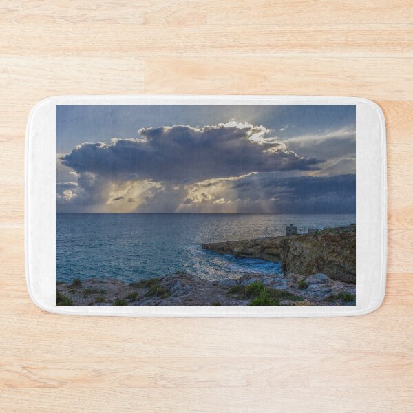 Item preview, Dramatic Cloud Over Ocean Horizon With Waves Crashing On Rocky Shore At Sunset designed and sold by Nmallia.