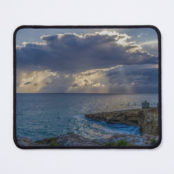 Item preview, Dramatic Cloud Over Ocean Horizon With Waves Crashing On Rocky Shore At Sunset designed and sold by Nmallia.