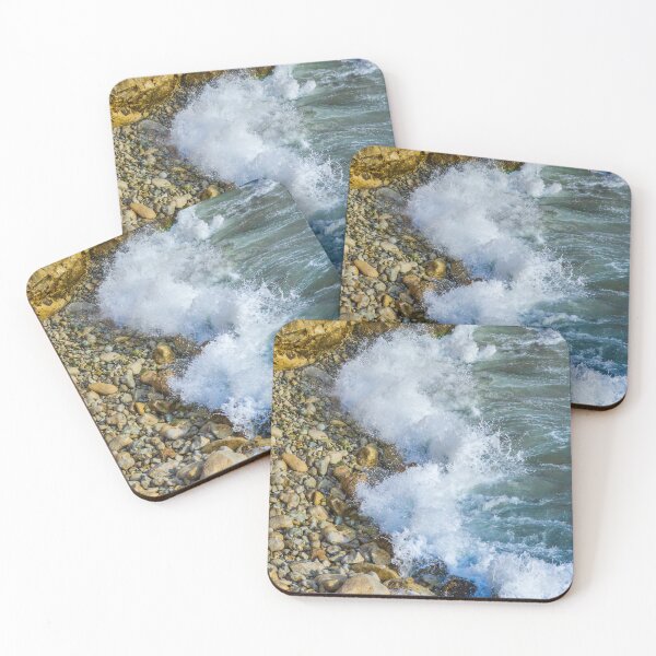 Item preview, Waves Crashing Against a Rocky Coastline With Splashing Sea Water, Pebble Beach and Sunlit Cliffs designed and sold by Nmallia.