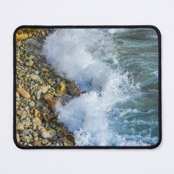 Item preview, Waves Crashing Against a Rocky Coastline With Splashing Sea Water, Pebble Beach and Sunlit Cliffs designed and sold by Nmallia.