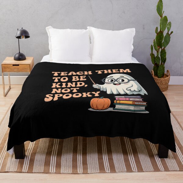 Item preview, Teach Them To Be Kind Not Spooky Cute Ghost Teacher Halloween Shirt designed and sold by Raw Tigers.