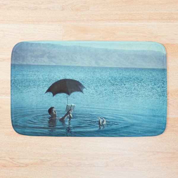 Item preview, Vintage Man with book and sunshade floating to show buoyancy of the Dead Sea photograph designed and sold by Jéanpaul  Ferro.
