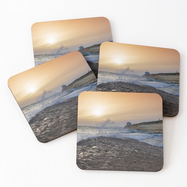 Item preview, Sunset Over Rocky Coastline With Waves, Cliff Fort And Distant Lighthouse On Calm Sea designed and sold by Nmallia.
