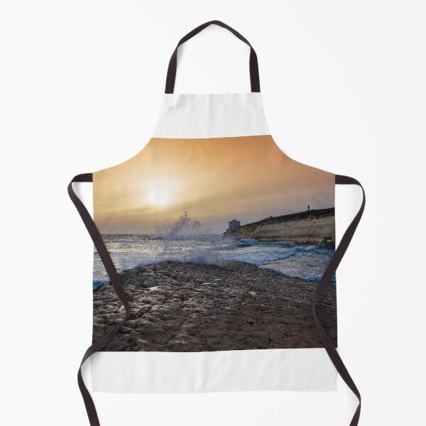Item preview, Sunset Over Rocky Coastline With Waves, Cliff Fort And Distant Lighthouse On Calm Sea designed and sold by Nmallia.