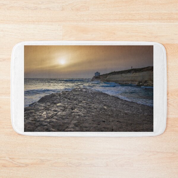 Item preview, Sunset Over Rocky Coastline With Waves, Cliff Fort And Distant Lighthouse On Calm Sea designed and sold by Nmallia.