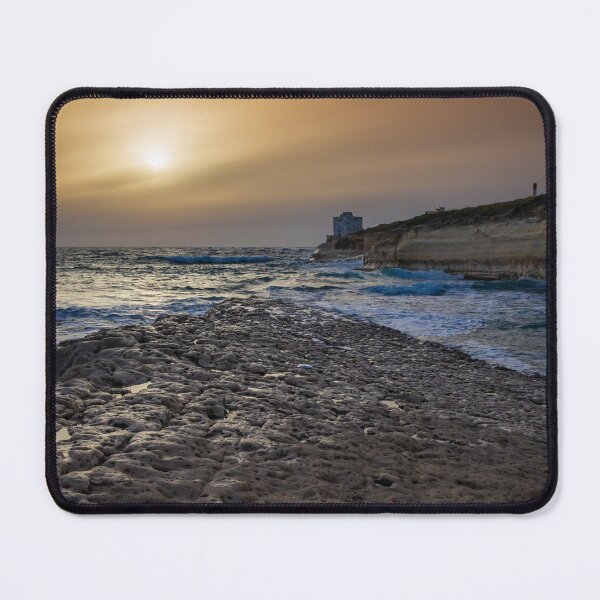 Item preview, Sunset Over Rocky Coastline With Waves, Cliff Fort And Distant Lighthouse On Calm Sea designed and sold by Nmallia.