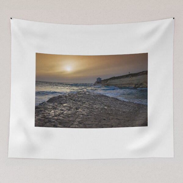 Item preview, Sunset Over Rocky Coastline With Waves, Cliff Fort And Distant Lighthouse On Calm Sea designed and sold by Nmallia.
