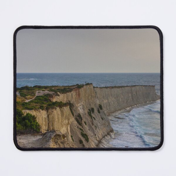 Item preview, Dramatic Coastal Cliffs Overlooking Rolling Sea Waves at Sunset With Rugged Vegetation and Path designed and sold by Nmallia.