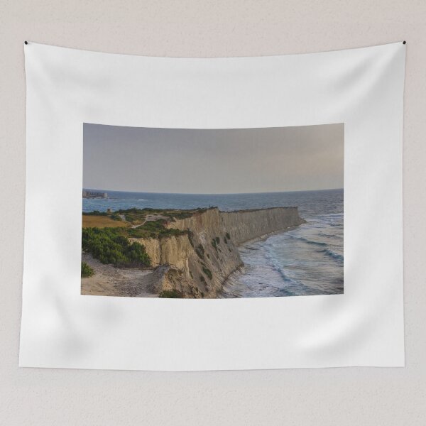 Item preview, Dramatic Coastal Cliffs Overlooking Rolling Sea Waves at Sunset With Rugged Vegetation and Path designed and sold by Nmallia.
