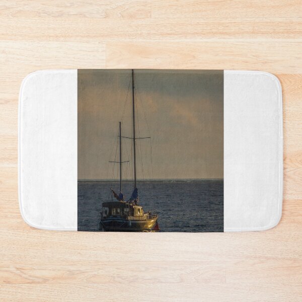 Item preview, Sailboat Anchored At Sea During Golden Sunset With Calm Waters And Dramatic Sky designed and sold by Nmallia.