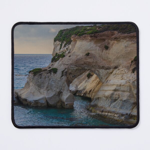 Item preview, Dramatic Coastal Sea Arch and White Limestone Cliffs Over Turquoise Waters at Sunset designed and sold by Nmallia.