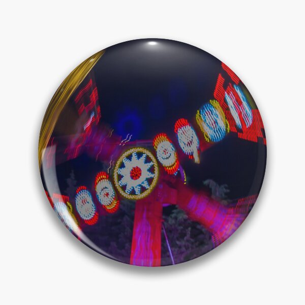 Item preview, Spinning Carnival Ride At Night With Colorful Lights And Motion Blur At An Amusement Park Fair designed and sold by Nmallia.
