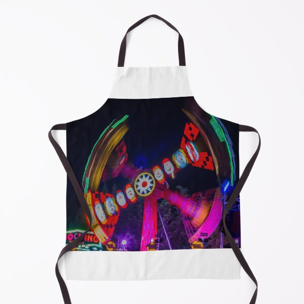 Item preview, Spinning Carnival Ride At Night With Colorful Lights And Motion Blur At An Amusement Park Fair designed and sold by Nmallia.