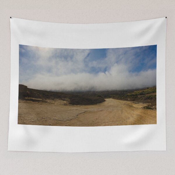 Item preview, Dirt Road Leading Through Foggy Countryside Landscape Under Dramatic Cloudy Sky designed and sold by Nmallia.