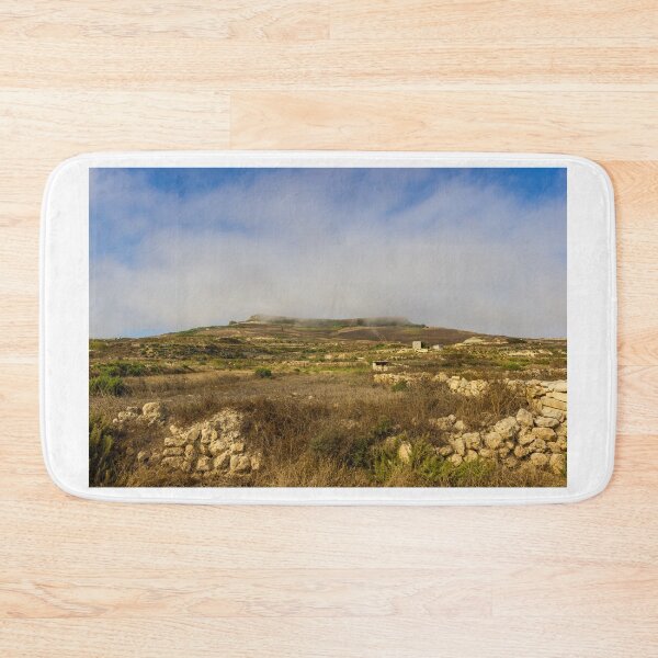 Item preview, Rural Landscape With Stone Walls and Rolling Hill Under Morning Fog and Blue Sky designed and sold by Nmallia.