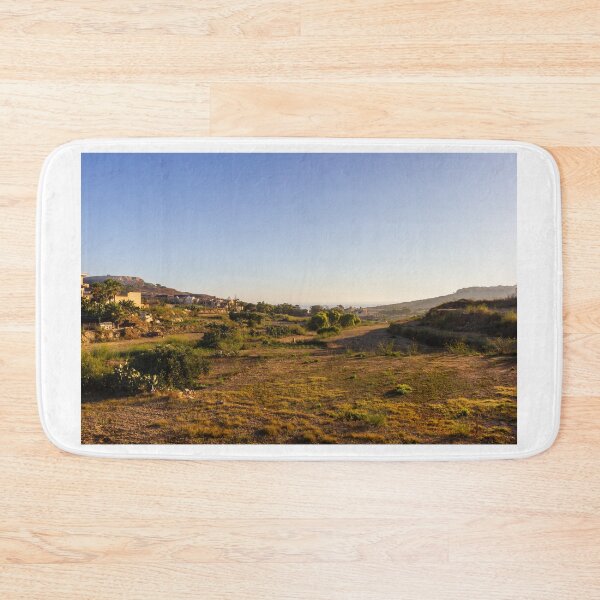 Item preview, Rural Landscape With Stone Walls and Rolling Hill Under Morning Fog and Blue Sky designed and sold by Nmallia.