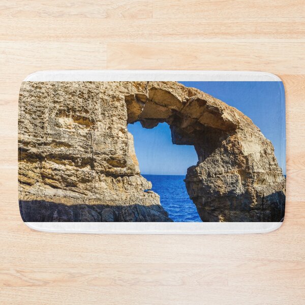 Item preview, Natural Sea Arch Framed By Rugged Limestone Cliffs Over Deep Blue Ocean designed and sold by Nmallia.