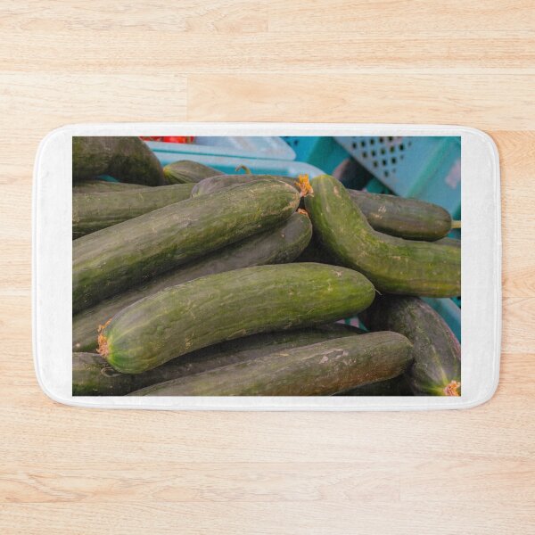 Item preview, Fresh Green Cucumbers Piled at Market Crates Fresh Produce Vegetables for Salads and Cooking designed and sold by Nmallia.