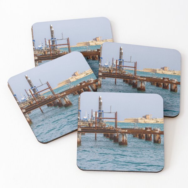 Item preview, Rusty Industrial Pier Construction And Harbour Works On Mediterranean Waterfront With Fort In Background designed and sold by Nmallia.