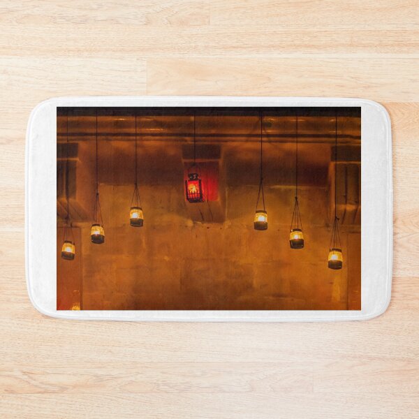 Item preview, Warm Hanging Lanterns And Candlelight Against A Rustic Wall For Cozy Ambient Lighting designed and sold by Nmallia.