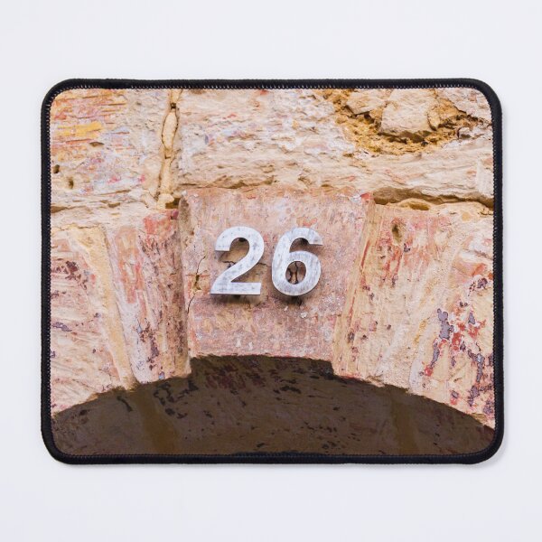 Item preview, Weathered Stone House Number 26 Over Arched Doorway On Rustic Masonry Facade designed and sold by Nmallia.