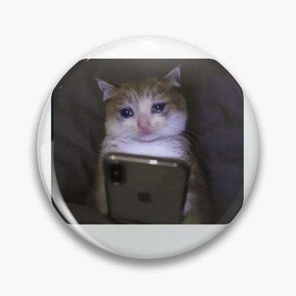 Item preview, sad cat holding phone meme designed and sold by cloudzer0000.