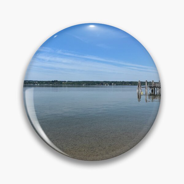 Item preview, Quiet wooden jetty on the wide blue lake designed and sold by Art of Momenz.