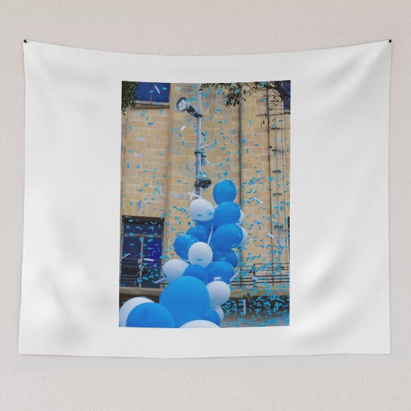 Item preview,  Blue and White Balloons and Confetti Celebration Outside Historic Building During Street Festival Parade designed and sold by Nmallia.