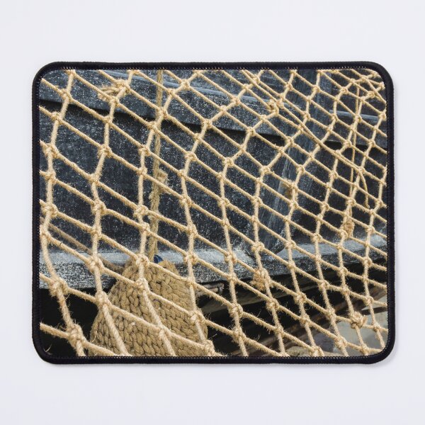 Item preview, Close-Up Of Rope Fishing Net Draped Over Weathered Wooden Boat Deck With Nautical Texture designed and sold by Nmallia.