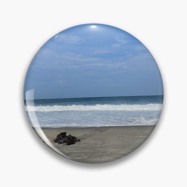 Item preview, Lonely driftwood on the wide ocean beach designed and sold by Art of Momenz.