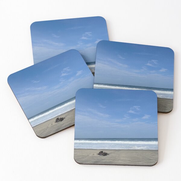 Item preview, Lonely driftwood on the wide ocean beach designed and sold by Art of Momenz.