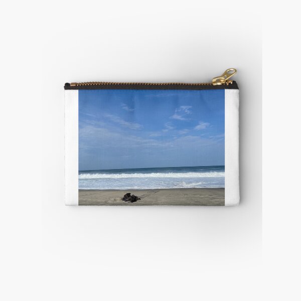 Item preview, Lonely driftwood on the wide ocean beach designed and sold by Art of Momenz.
