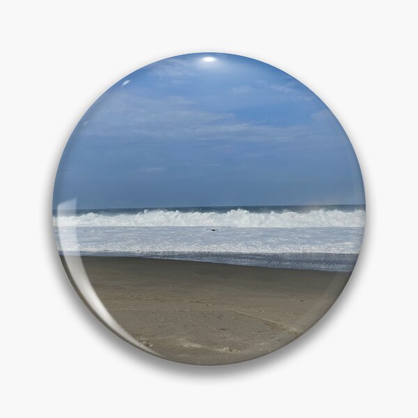 Item preview, Footprints in the sand on the roaring ocean beach designed and sold by Art of Momenz.
