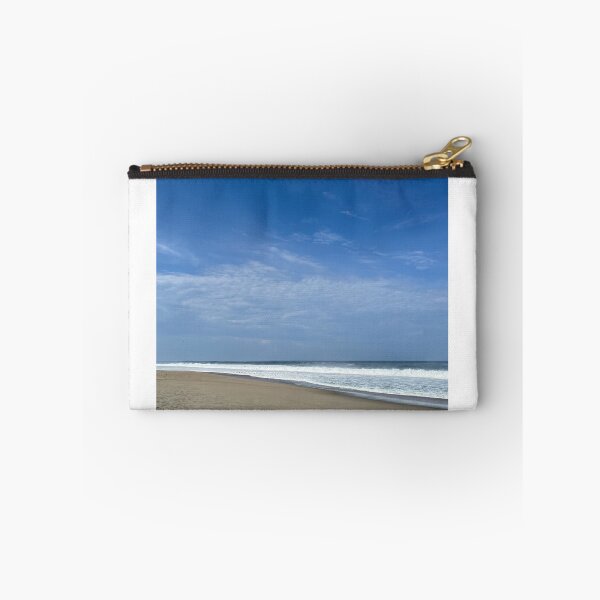 Item preview, Endless blue summer sky over a wide sandy beach designed and sold by Art of Momenz.