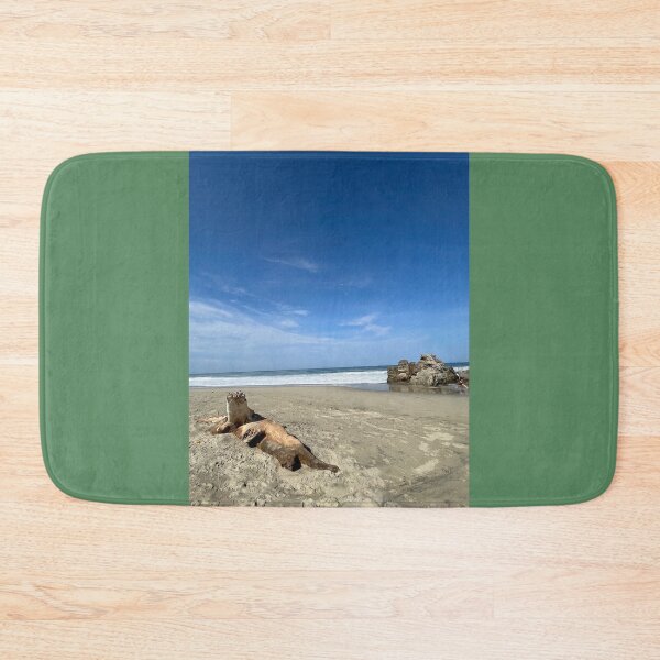 Item preview, Striking driftwood and rocky cliffs on the ocean beach designed and sold by Art of Momenz.
