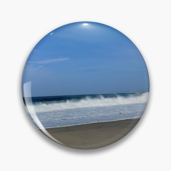 Item preview, Powerful white ocean spray on the wide sandy beach designed and sold by Art of Momenz.