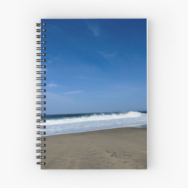 Item preview, Powerful white ocean spray on the wide sandy beach designed and sold by Art of Momenz.