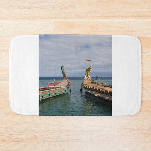Item preview, Colorful Viking Boats Docked on Calm Sea Near Shore Under Cloudy Sky designed and sold by Nmallia.