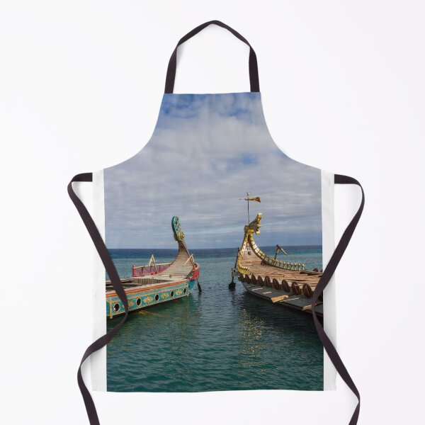 Item preview, Colorful Viking Boats Docked on Calm Sea Near Shore Under Cloudy Sky designed and sold by Nmallia.