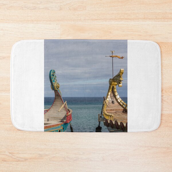 Item preview, Colorful Viking Boats Docked on Calm Sea Near Shore Under Cloudy Sky designed and sold by Nmallia.