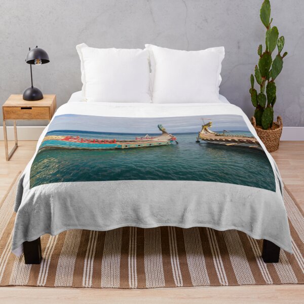 Item preview, Colorful Viking Boats Docked on Calm Sea Near Shore Under Cloudy Sky designed and sold by Nmallia.