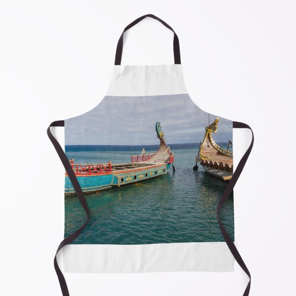 Item preview, Colorful Viking Boats Docked on Calm Sea Near Shore Under Cloudy Sky designed and sold by Nmallia.