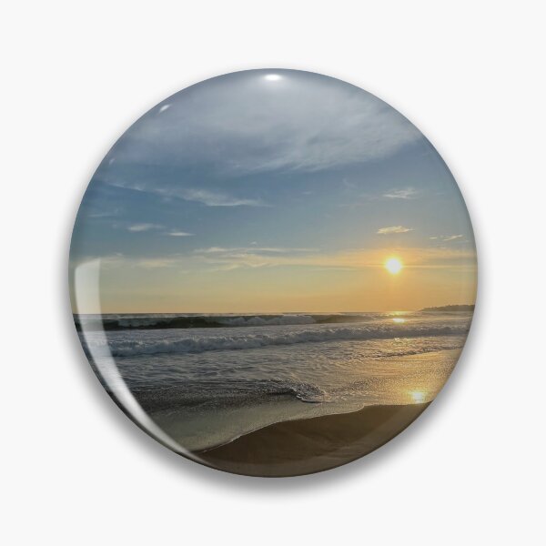 Item preview, Golden evening sun reflects off wet ocean beach designed and sold by Art of Momenz.