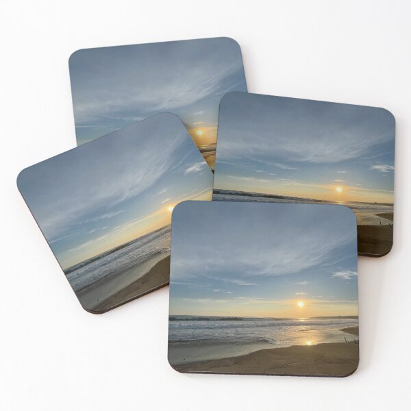 Item preview, Golden evening sun reflects off wet ocean beach designed and sold by Art of Momenz.