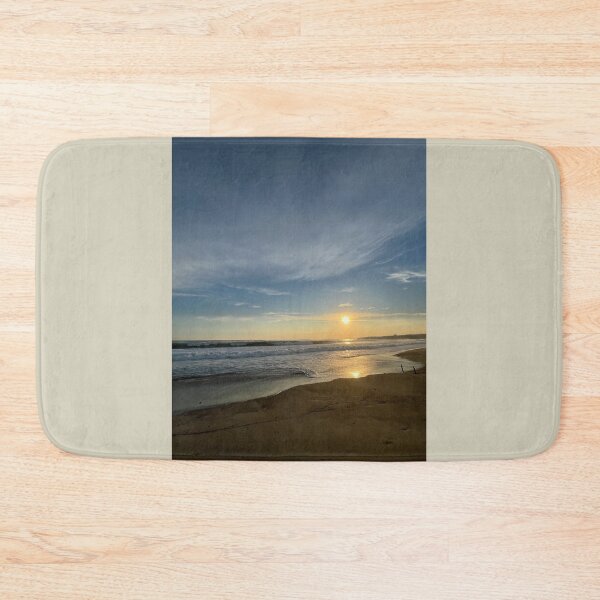 Item preview, Golden evening sun reflects off wet ocean beach designed and sold by Art of Momenz.
