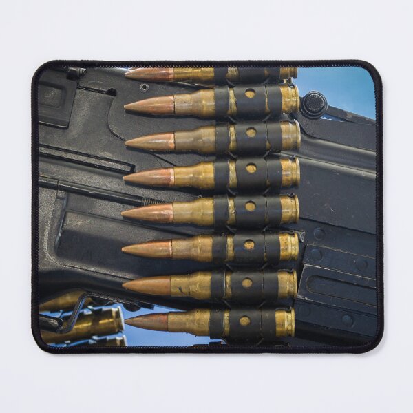 Item preview, Close-Up Of Belted Ammunition And Machine Gun Receiver With Copper Bullets On Display designed and sold by Nmallia.